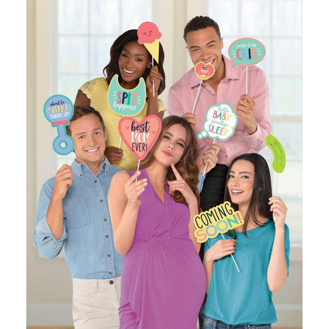 Colorful baby shower photo props pack of 13 including bottles, shoes, and fun signs for memorable moments.