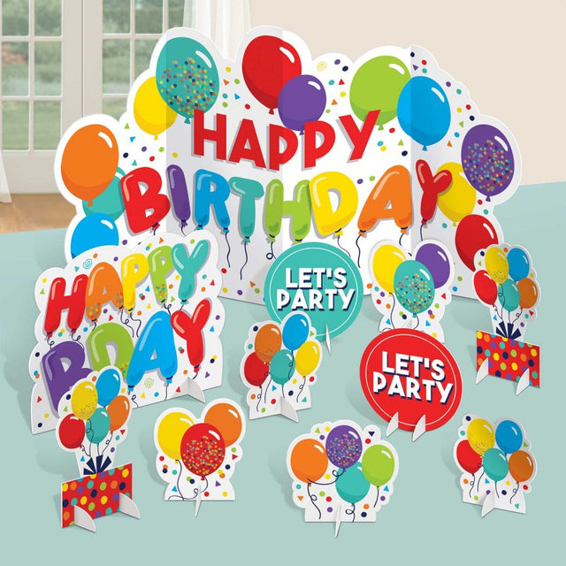 Vibrant Table Centrepiece Kit for birthdays featuring 11 colorful decorations in various sizes, perfect for festive celebrations.
