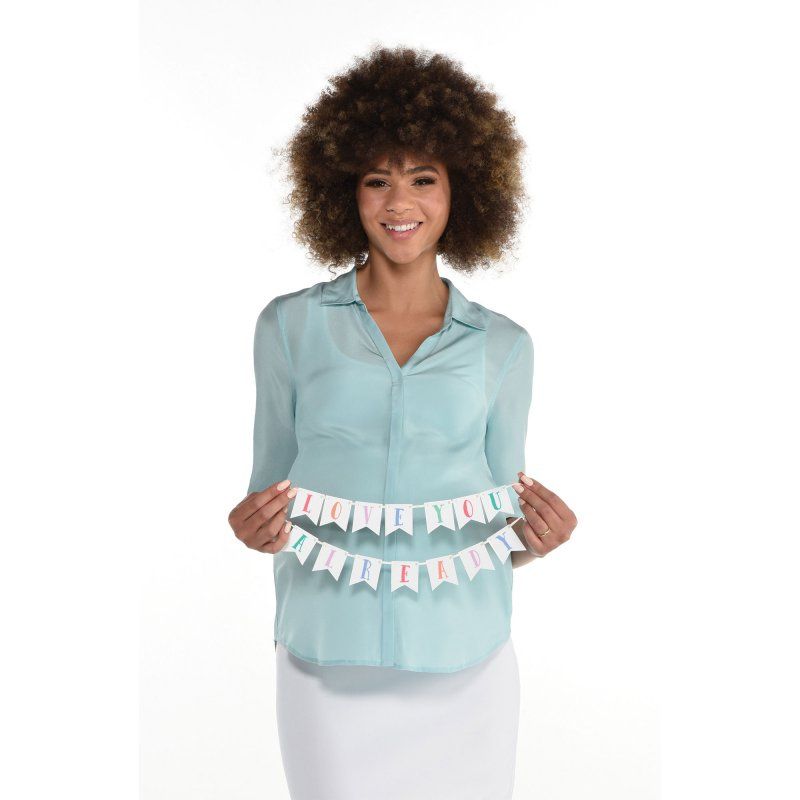 Decorative mini pennant banner featuring 'Love You Already' text, perfect for baby shower celebrations.