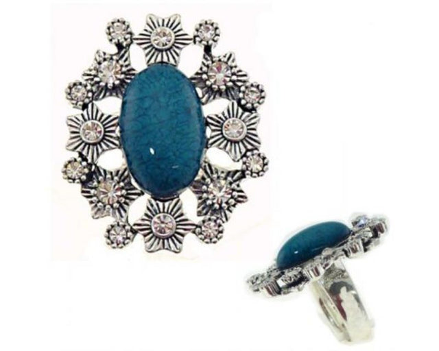 Set of three large oval rings featuring teal resin centers with sparkling diamante surrounds in sizes 7, 8, and 9.