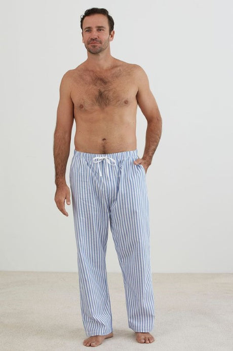 Comfortable blue and white striped XL PJ pants with elastic waistband and side pockets, made from breathable cotton.