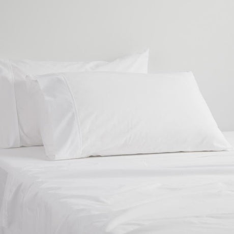 Double sheet set in white, featuring 250TC poly/cotton percale with cuffed details and a 50cm fitted sheet wall.