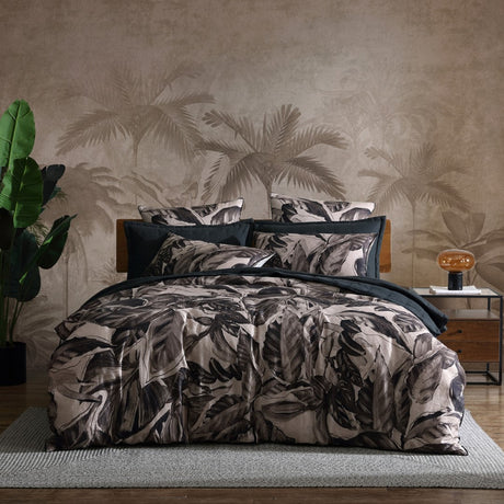 King Duvet Cover Set featuring lush foliage on cotton sateen, with a stylish ikat reverse and refined piping for luxury.