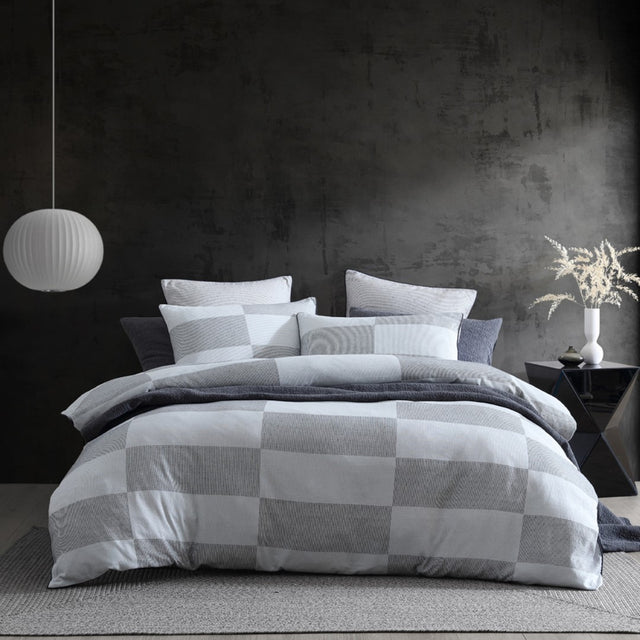 Queen duvet cover set in Region Grey features modern geometric design, crafted from 100% cotton jacquard for timeless elegance.