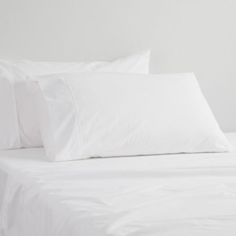 Pair of 400TC Egyptian cotton white pillowcases, soft sateen finish, measuring 48cm x 73cm.