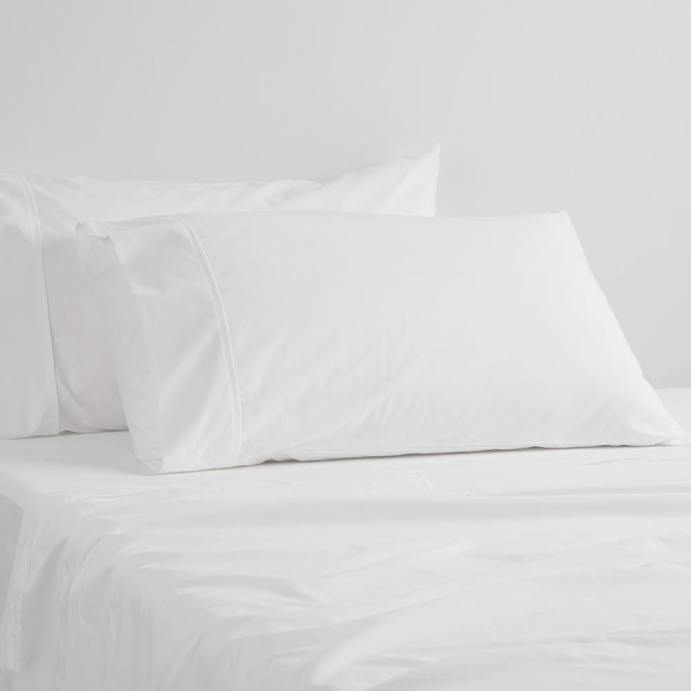 White standard pillowcase set featuring a durable 250TC poly/cotton percale blend, designed for comfort and style.