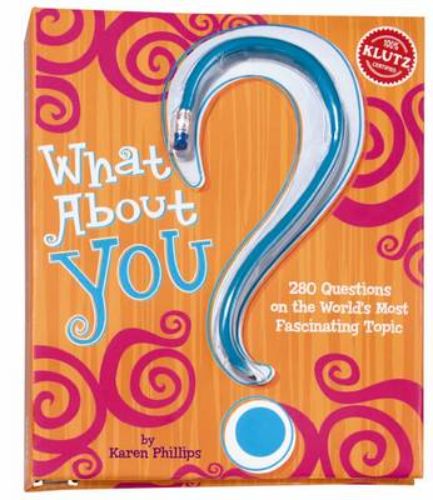 A tween girl explores self-discovery with the 'What About You?' survey book and glittery pencil, focusing on fun introspection.