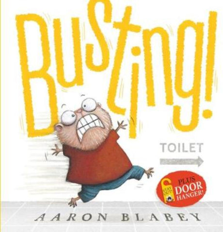 Hardback picture book 'Busting!' by Aaron Blabey with colorful illustrations and door hanger for kids' bathroom fun.