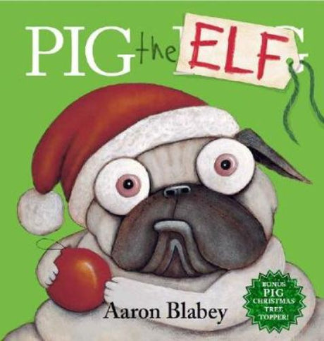 Hardback book 'Pig the Elf' about a greedy pug's Christmas adventure, includes a bonus tree topper.