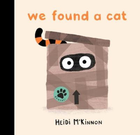 Hardcover picture book titled 'We Found a Cat' featuring illustrations of a cat with whiskers and a long tail.