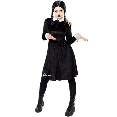 Women's Wednesday Addams costume in size 16-18, featuring a black dress with white collar and matching wig for Halloween fun.