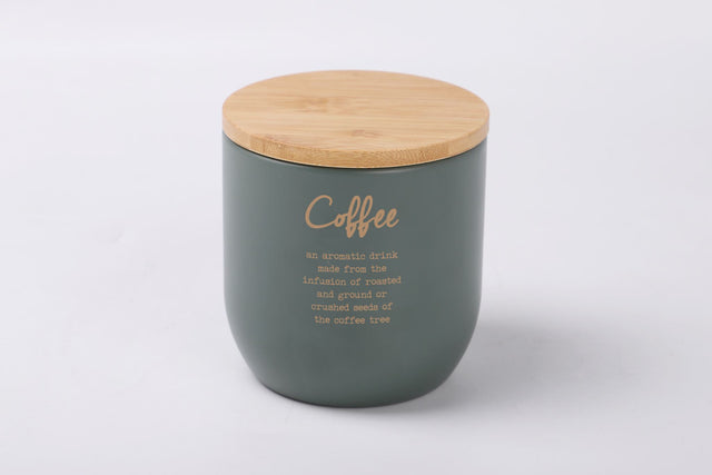 Stylish gray-green metal coffee tin with gold lettering, bamboo lid, and airtight seal for preserving freshness.