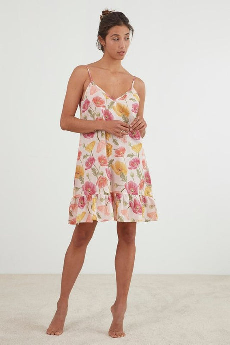 Delicate pink poppy-inspired nightie with adjustable straps, frilled hem, and OEKO-TEX® certified cotton fabric.