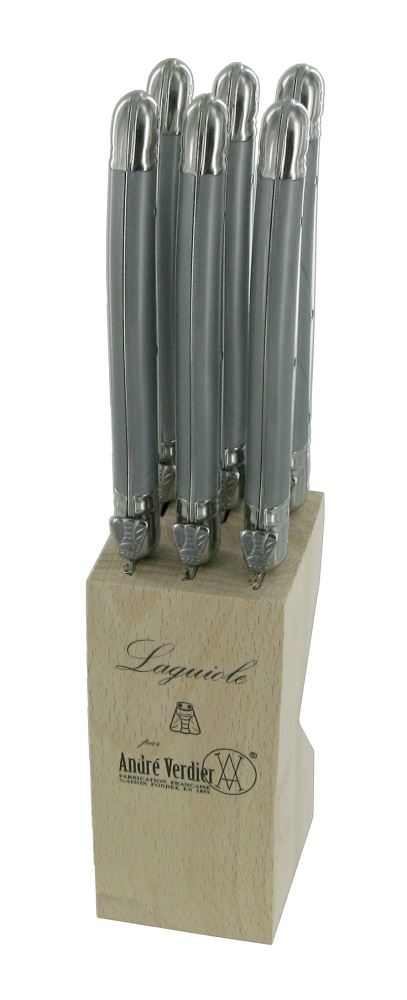 Sleek grey knife block designed to stylishly organize and securely hold professional-grade knives in modern kitchens.