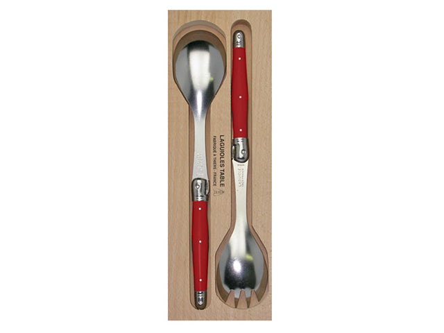 Bright red salad server set with stainless steel and resin handles, featuring Laguiole Bee insignia, packaged in a wooden gift tray.