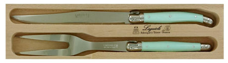 Pale green carving set with stainless steel knife and fork, featuring ergonomic resin handles and Laguiole bee symbol.