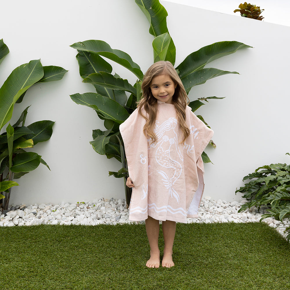 Kids' poncho towel with ocean print, UPF 50+ sun protection, soft velour, ideal for beach or pool adventures.
