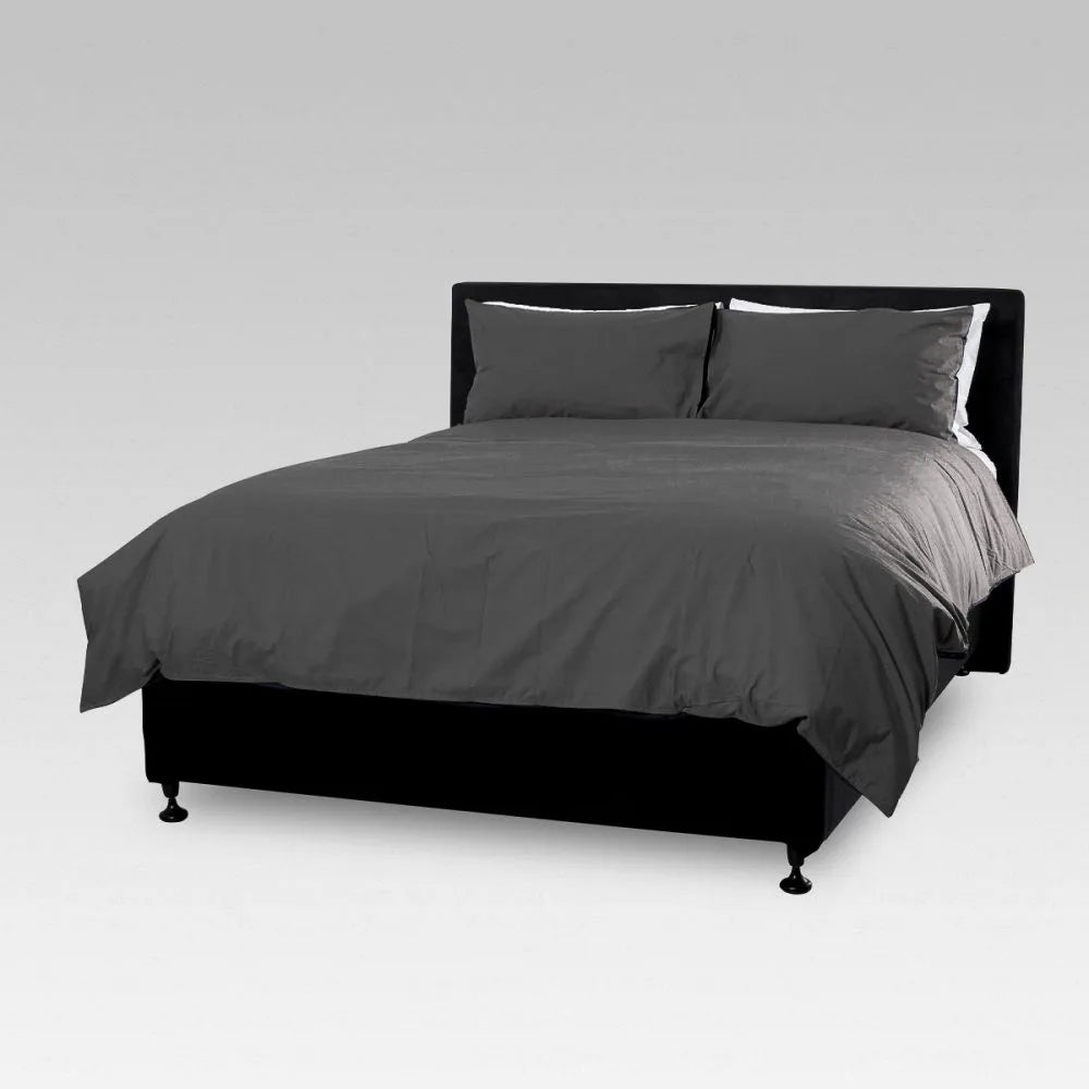 Charcoal super king duvet cover set made of durable percale; colourfast, comfortable, and ideal for various accommodations.