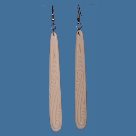 Handcrafted large bone drop earrings, showcasing Maori artistry with unique designs, perfect for statement style and comfort.