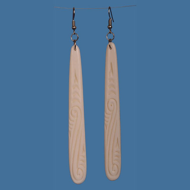 Handcrafted large bone drop earrings, showcasing Maori artistry with unique designs, perfect for statement style and comfort.