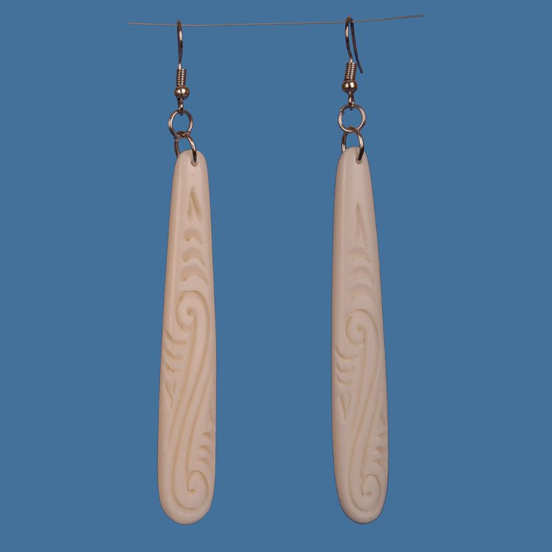 Handcrafted medium bone drop earrings featuring unique Maori patterns, perfect for cultural events or daily wear.