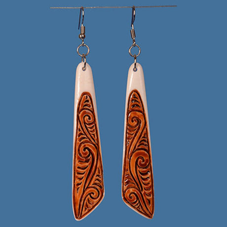 Exquisite Maori drop earrings with stained koru designs, handcrafted from premium beef bone, measuring 75mm x 18mm.