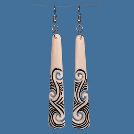 Intricate Maori-inspired drop earrings crafted from beef bone, featuring Moko markings in a lightweight design.