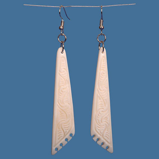 Bone Drop Earrings showcasing intricate Maori carvings, handcrafted from lightweight beef bone, measuring 71mm x 16mm.