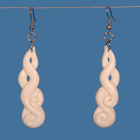 Handcrafted Bone Koru Earrings featuring iconic Maori design, symbolizing growth and regeneration, measuring 55 mm in length.