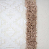 Sedona Rectangle Cushion in Cappuccino features geometric embroidery and soft tufting, perfect for adding style and comfort.