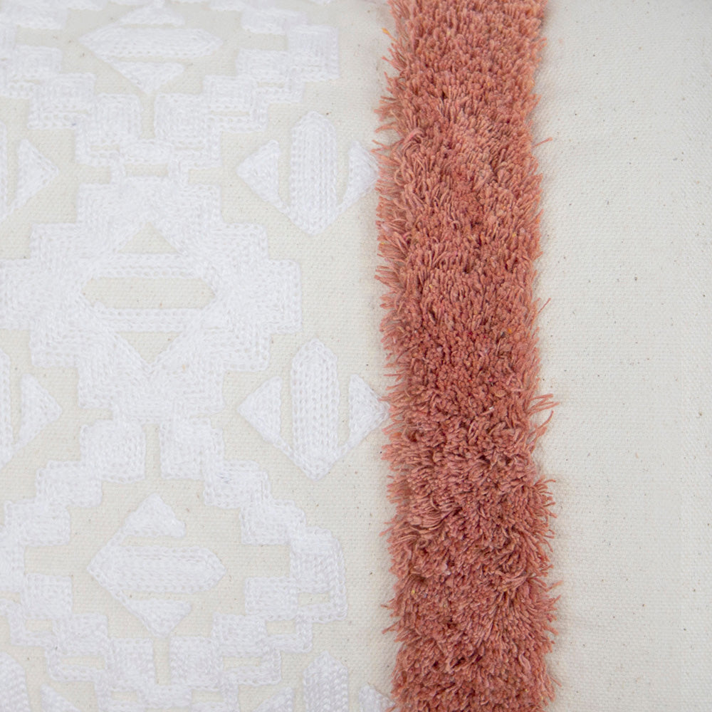 Sedona Rectangle Cushion in Clay featuring geometric embroidery, cotton tufting, and plush support, ideal for decor and comfort.