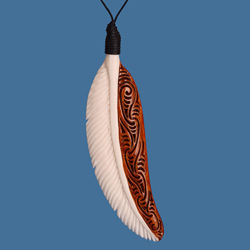 Bone Feather Pendant made from natural beef bone with intricate carvings and rich staining, elegant and unique accessory.