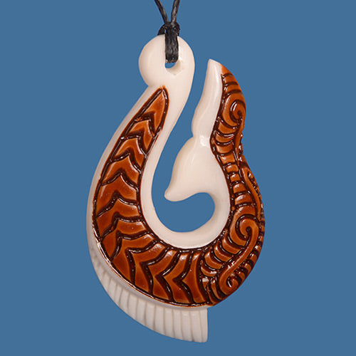 Bone Hook Pendant with intricate carvings on a black adjustable cord, symbolizing good fortune and safe travels.