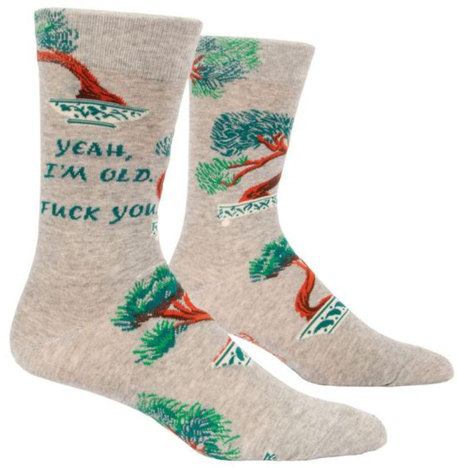 Humorous Blue Q men's socks featuring 'Yeah, I'm Old' phrase, made for comfort and style in sizes 7-12.