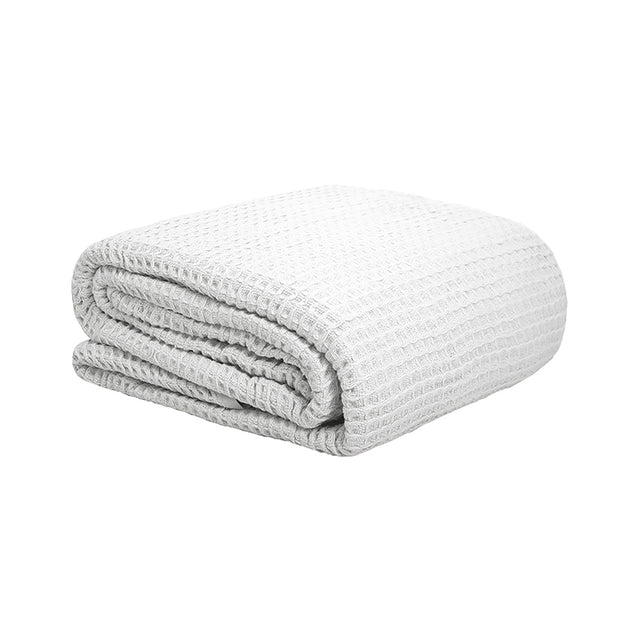 Elegant white waffle weave blanket for Queen/King beds, lightweight cotton, perfect for year-round comfort.
