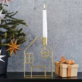 Cosy Copper Gold Metal House Candle Holder, 20cm high, adds warmth and style with its unique house design and luxurious finish.