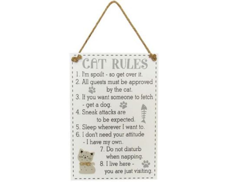 Rustic wood sign featuring whimsical cat rules, perfect for cat lovers' home decor, measures 35x24 cm.