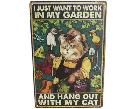 Charming retro tin art sign featuring a whimsical garden and cat design, perfect for indoor or outdoor decor.