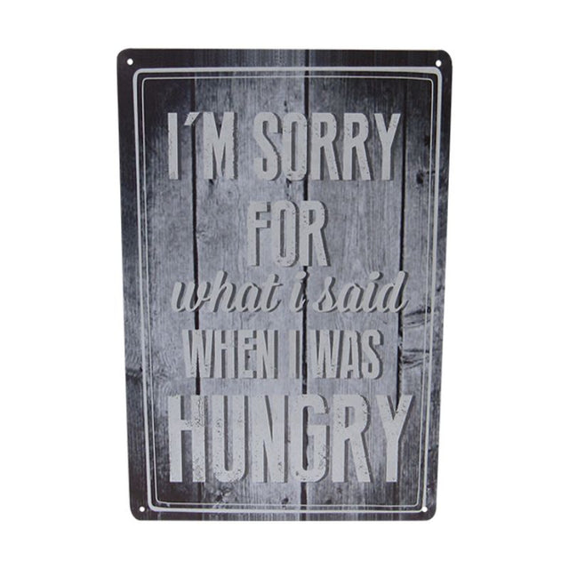 Retro tin art sign 'Hungry' featuring vibrant colors, perfect for kitchens and cafes, measuring 30cm x 20cm.