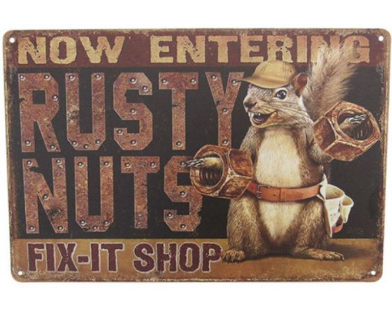 Quirky retro tin sign featuring a rusty nuts design, perfect for home or garage decor, measuring 30cm x 20cm.