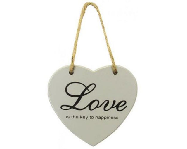 Silver heart wall decor measuring 10.5 cm, featuring an inspiring message for positivity and connection.