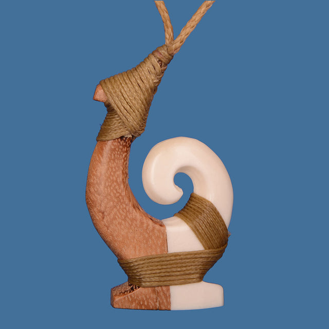 Handcrafted Bone and Wood Hook with Koru Pendant, symbolizing new beginnings, growth, and safe travels over water.