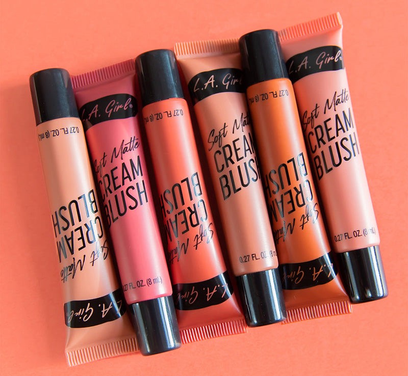 Soft Matte Cream Blush in Kiss Up by LA Girl, featuring a gel-like texture for a natural flush on cheeks and lips.