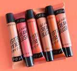 Soft Matte Cream Blush in Kiss Up by LA Girl, featuring a gel-like texture for a natural flush on cheeks and lips.