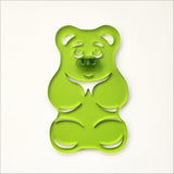 Lime green satin acrylic Gummy Bear wall art, 88mm x 139mm, playful and moisture-resistant decor piece.