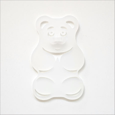 White satin acrylic gummy bear art piece, 88mm x 139mm, adds playful charm to any decor, perfect for kitchens and bathrooms.