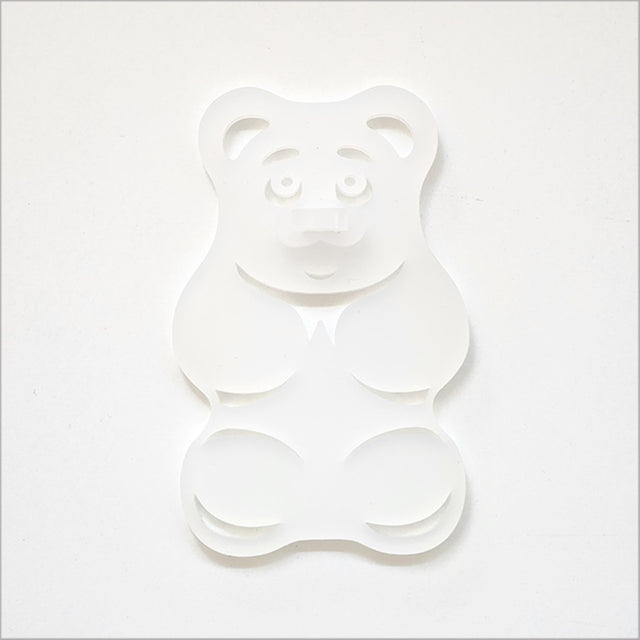 White satin acrylic gummy bear art piece, 88mm x 139mm, adds playful charm to any decor, perfect for kitchens and bathrooms.