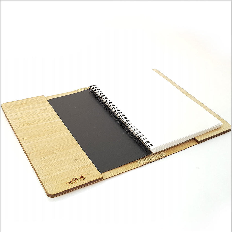 Geometric Fantail Notebook in NZ Silver Beech with Bamboo Veneer, featuring a unique artistic design and eco-friendly materials.