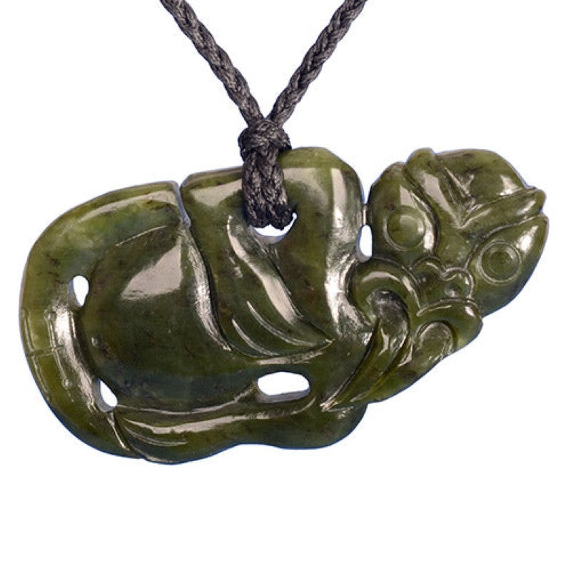 Jade Side Hanging Tiki Pendant, hand-carved, 84mm x 45mm, symbolizes good luck and fertility, on adjustable cord.