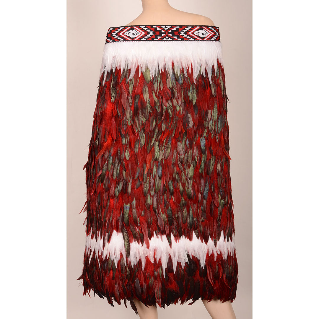 Beautiful Korowai - Pohutukawa cloak featuring vibrant Pohutukawa floral design, handcrafted with unique taniko trim and feather details.